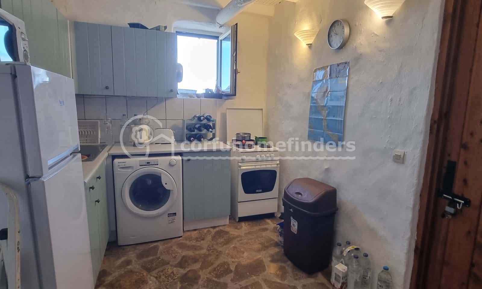 Listing photograph 2 of 15 of the house in Sinarades, published by Corfu Home Finders.