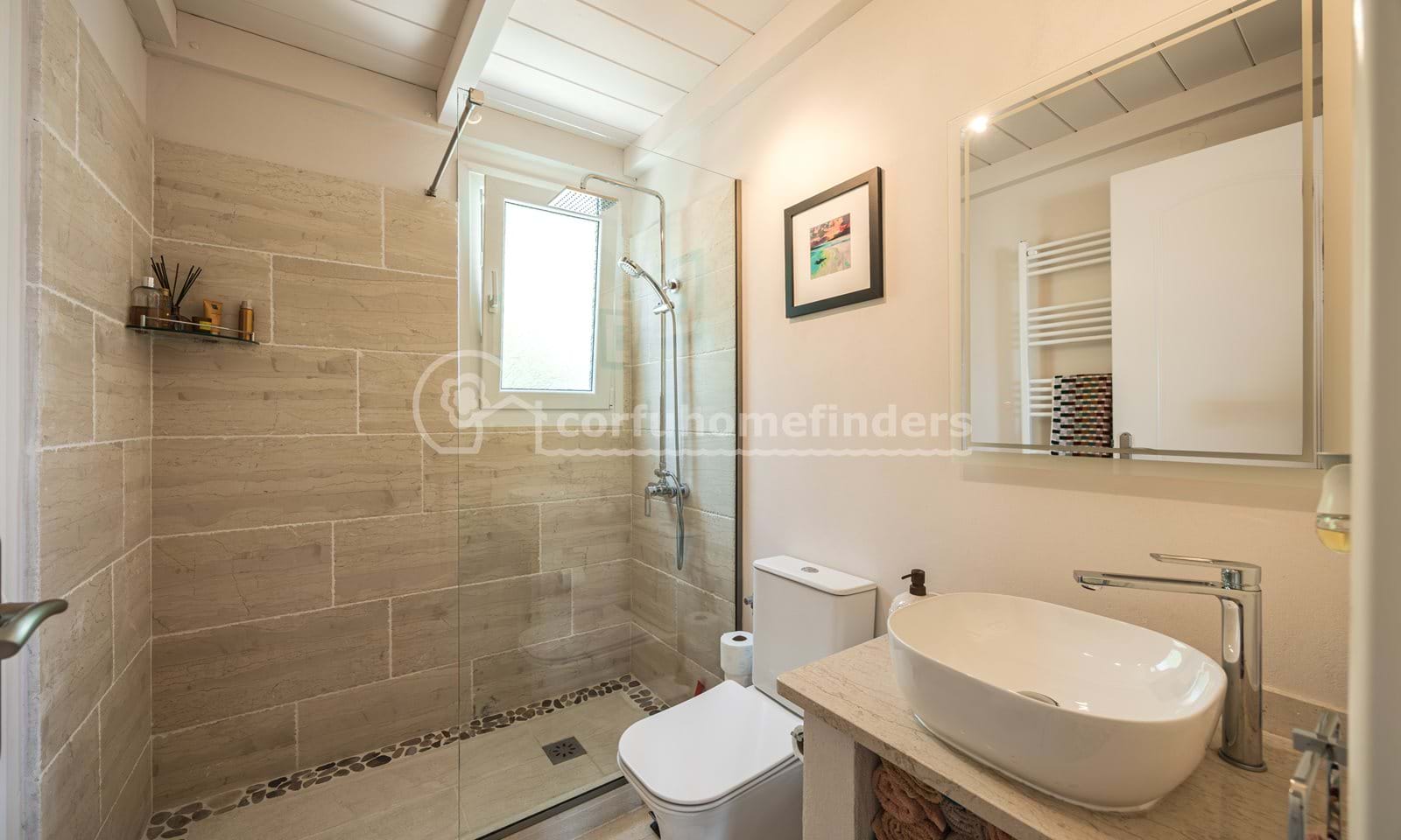 Listing photograph 15 of 19 of the house in Loutses, published by Corfu Home Finders.