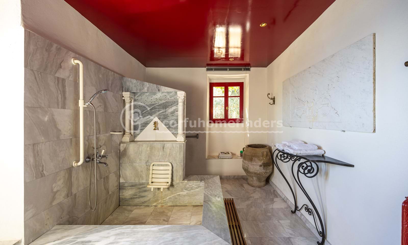 Listing photograph 12 of 19 of the house in Kassiopi, published by Corfu Home Finders.
