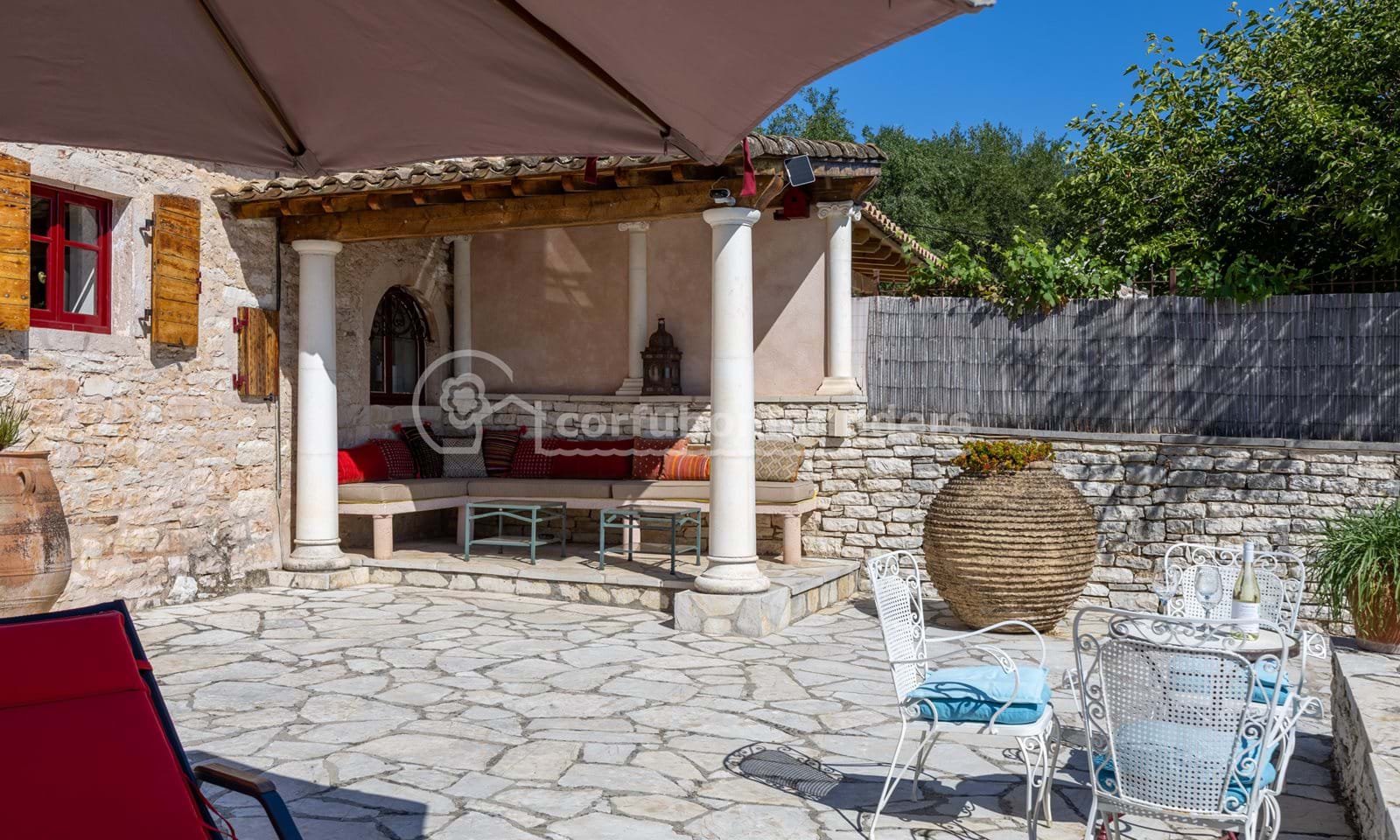 Listing photograph 3 of 19 of the house in Kassiopi, published by Corfu Home Finders.