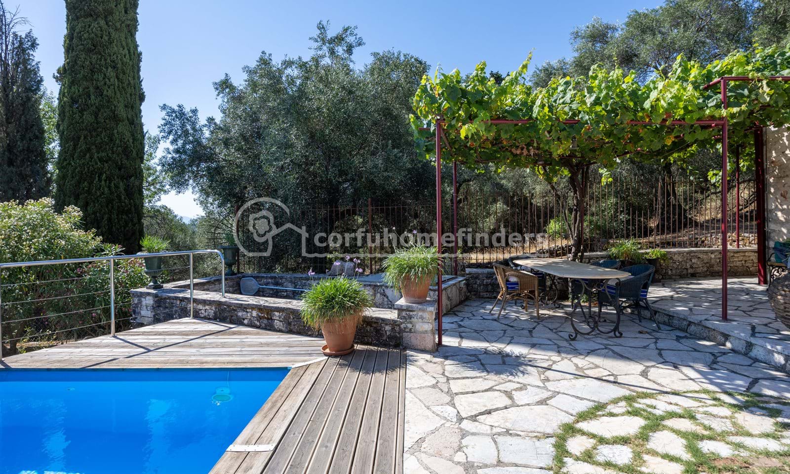 Listing photograph 2 of 19 of the house in Kassiopi, published by Corfu Home Finders.