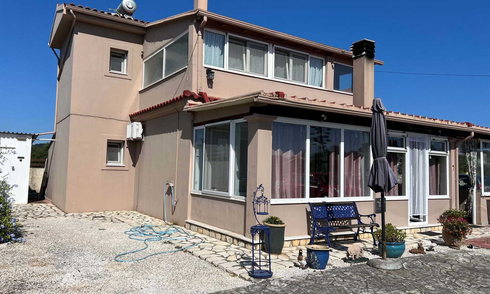 Listing photograph 1 of 22 of the house in Roda, published by Corfu Home Finders.