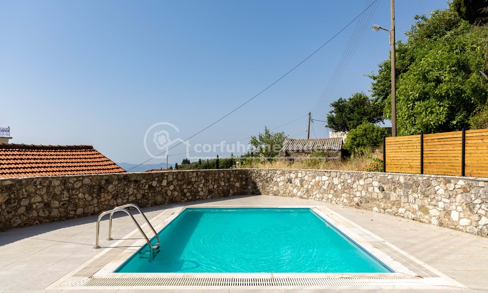 Listing photograph 2 of 21 of the house in Spartilas, published by Corfu Home Finders.