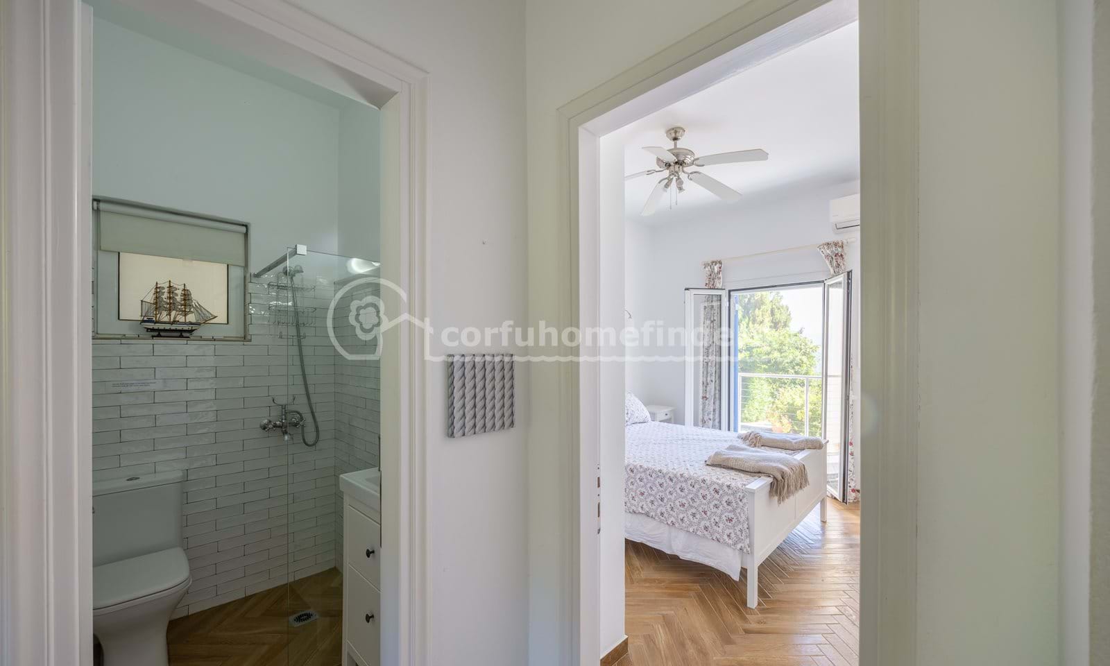 Listing photograph 19 of 28 of the house in Kassiopi, published by Corfu Home Finders.