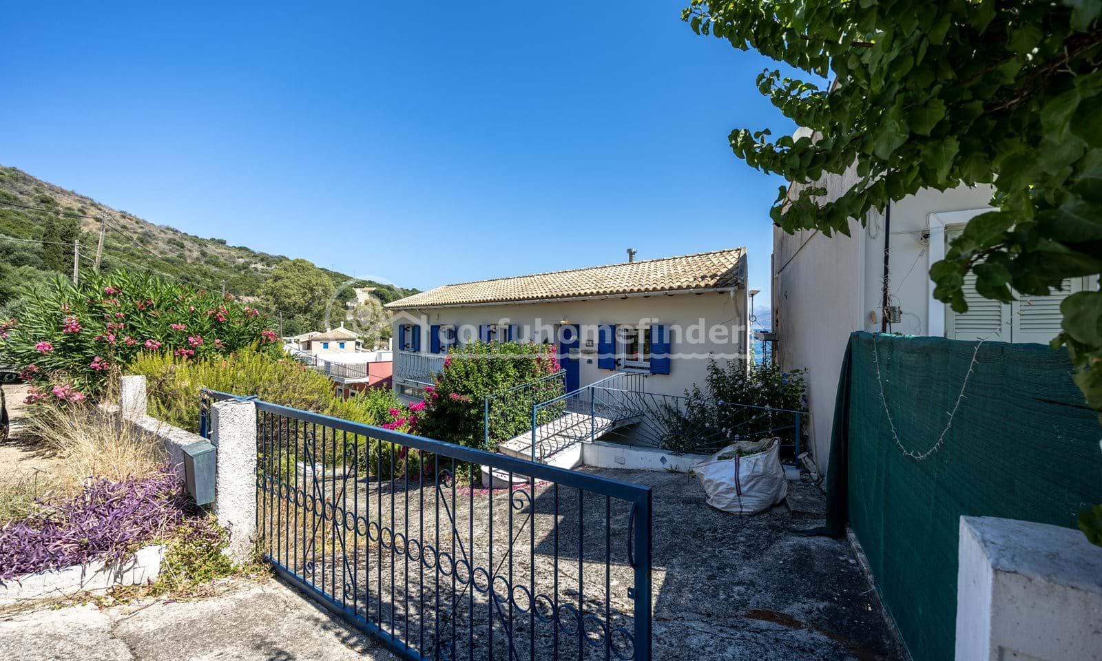 Listing photograph 4 of 28 of the house in Kassiopi, published by Corfu Home Finders.