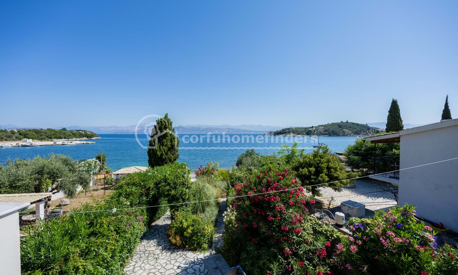 Listing photograph 11 of 28 of the house in Kassiopi, published by Corfu Home Finders.