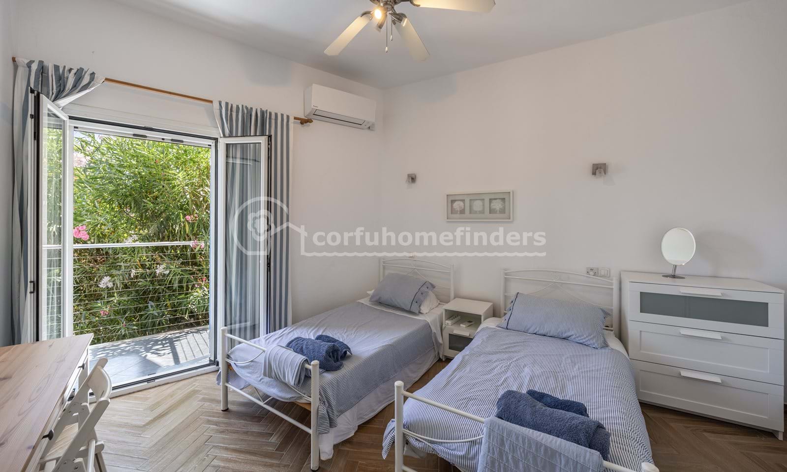 Listing photograph 22 of 28 of the house in Kassiopi, published by Corfu Home Finders.
