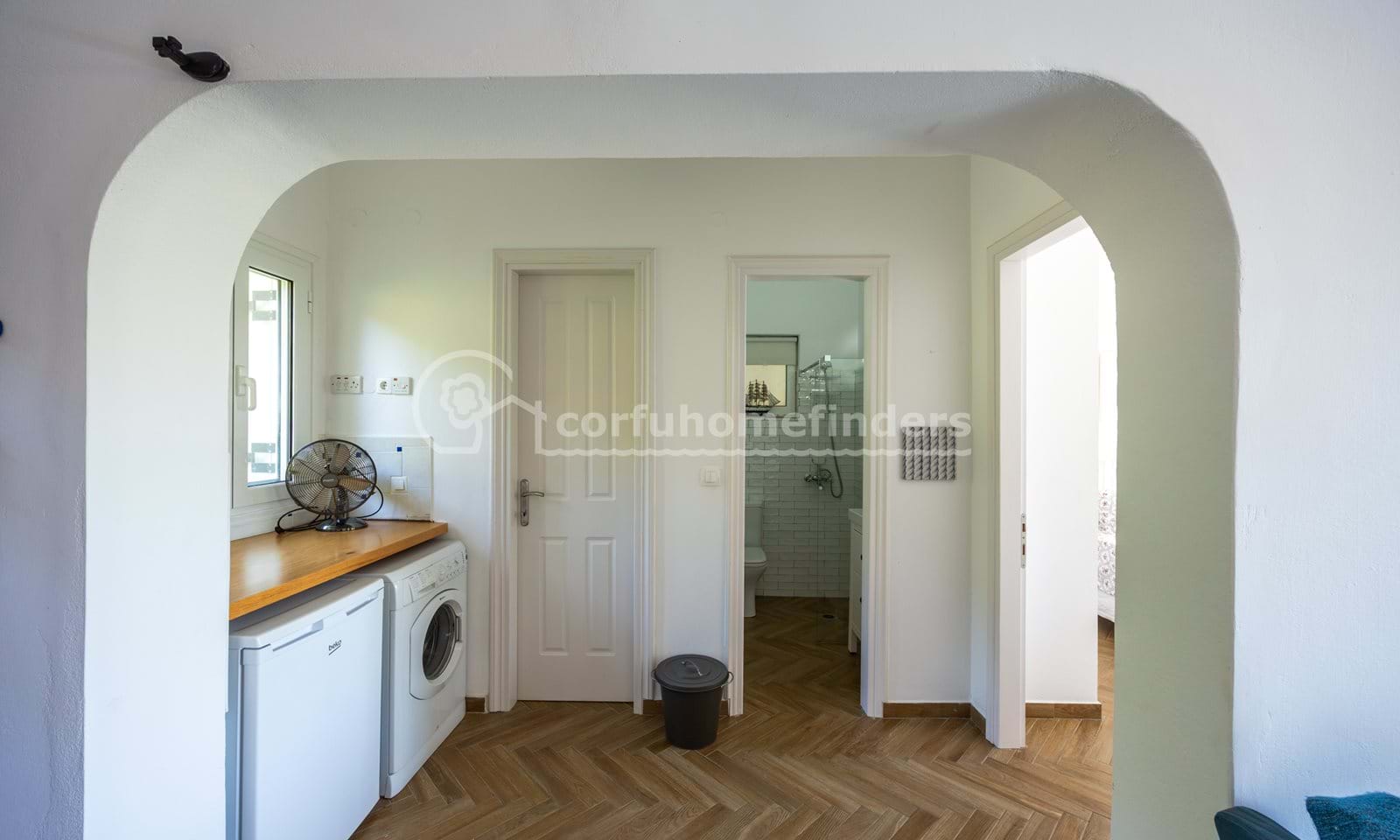 Listing photograph 21 of 28 of the house in Kassiopi, published by Corfu Home Finders.