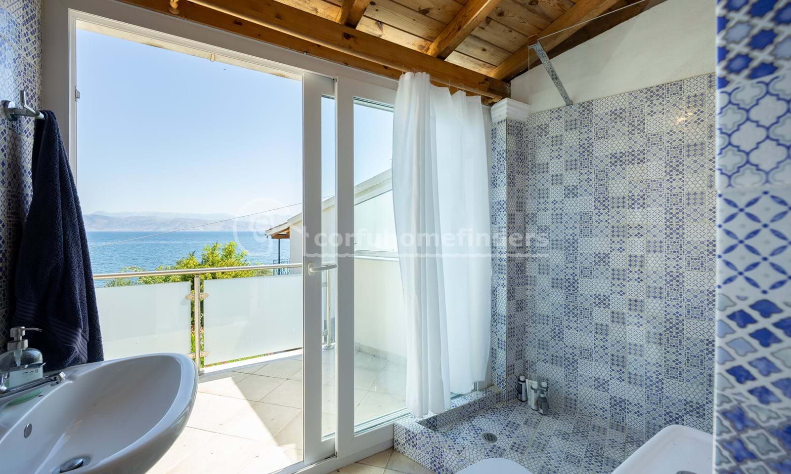 Listing photograph 16 of 28 of the house in Kassiopi, published by Corfu Home Finders.