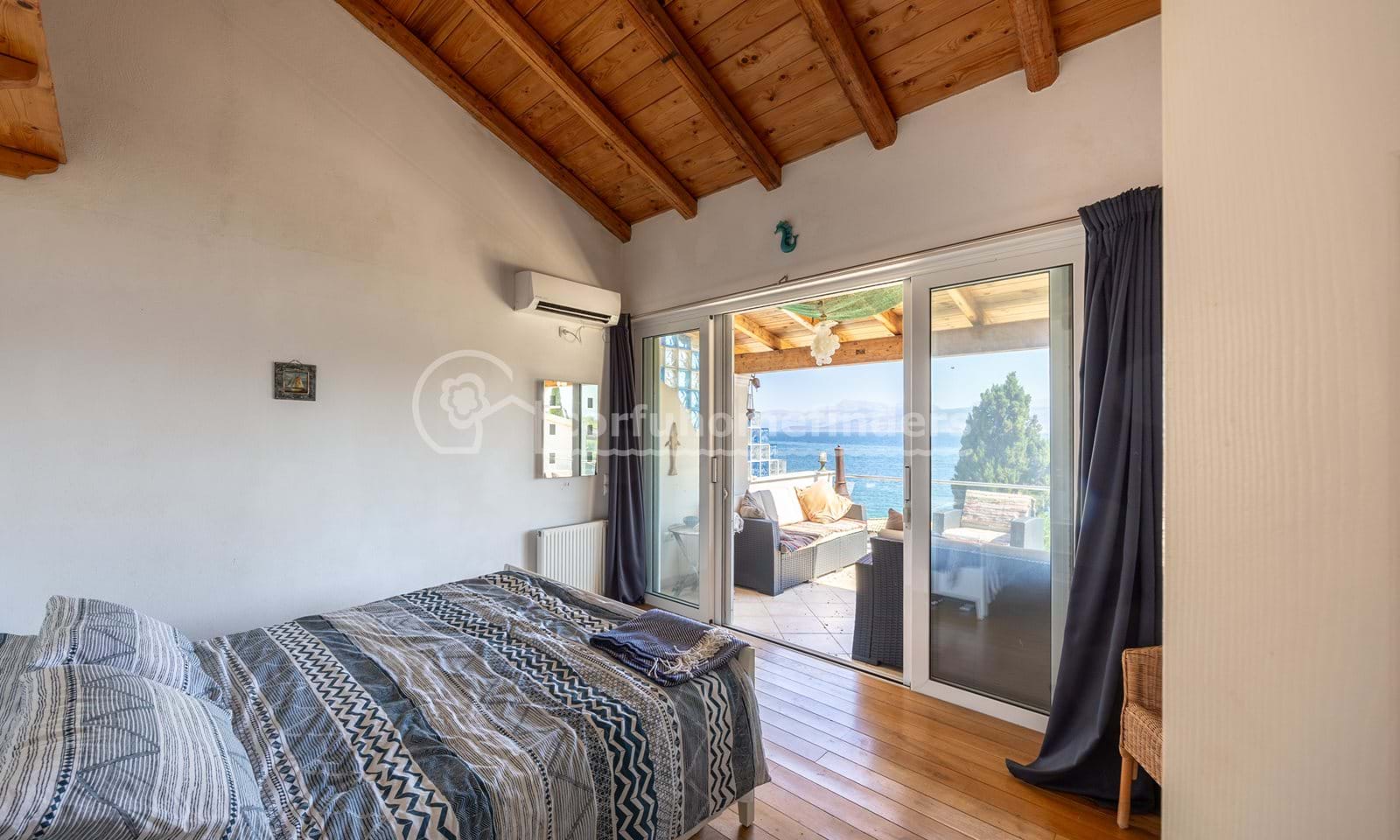 Listing photograph 13 of 28 of the house in Kassiopi, published by Corfu Home Finders.