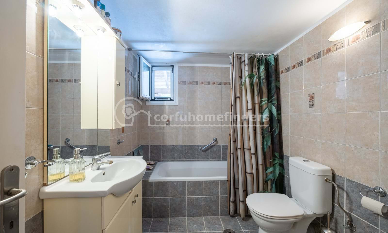 Listing photograph 19 of 27 of the house in Kouramades, published by Corfu Home Finders.