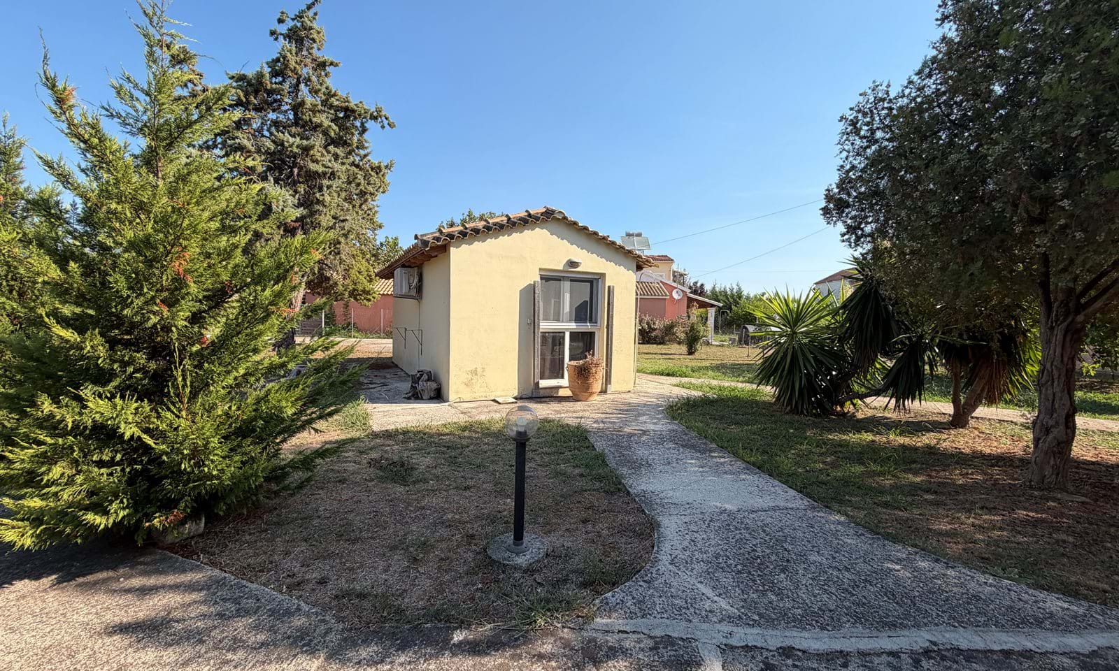 Listing photograph 19 of 23 of the house in Agnos, published by Corfu Home Finders.