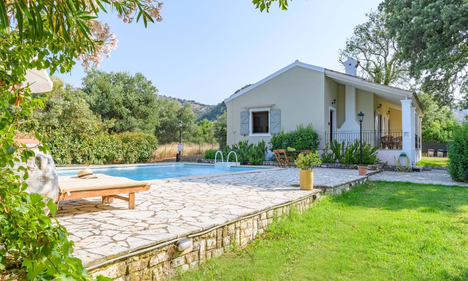This beautifully designed villa is in the quiet hills of Loutses village, located between Old Peritheia and a short drive to the beaches of Kalamaki and St. Spyridon. The house enjoys lovely views looking over to the sea and mountains of the mainland to have privacy and extra space outside. The main entrance is through the kitchen and dining room with a window glazing over to the pool. The house is ideal for families, giving you the freedom of privacy and short drive to Acharavi for all amenities. It could be used for a summer rental or for your own personal use.
