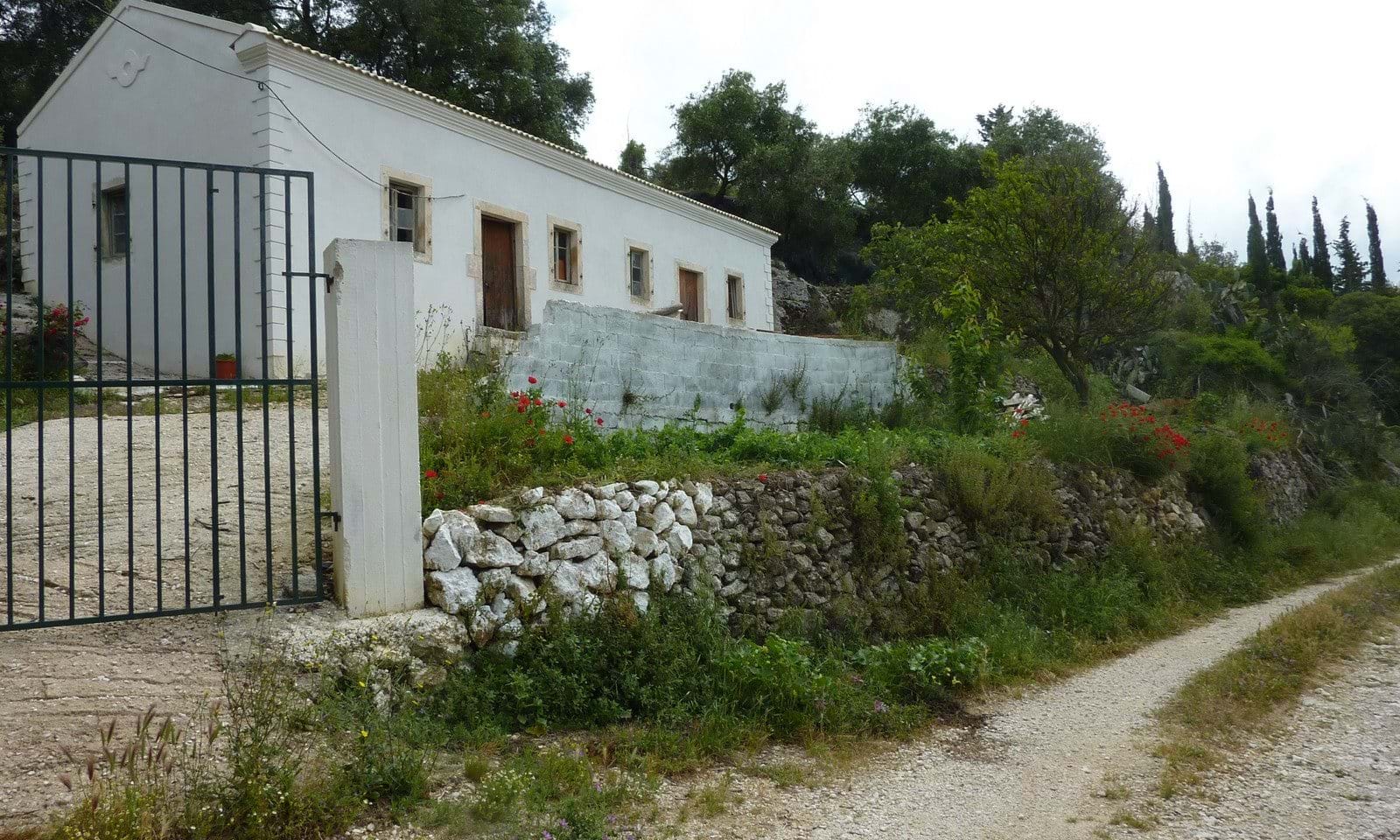 A very attractive building in a traditional style, with lots of potential. This house has had all the major structural work completed including a new roof and plastering. The inside has not yet been completed, but there is plenty of room for two bedrooms and a large living area and kitchen. The house is set in a large olive grove just above a quiet track and there is another plot of land below the track which also belongs to the property. Behind the house are some more old buildings (about 65 m2) which have not yet been renovated - these could be used as additional accommodation, or as storage.