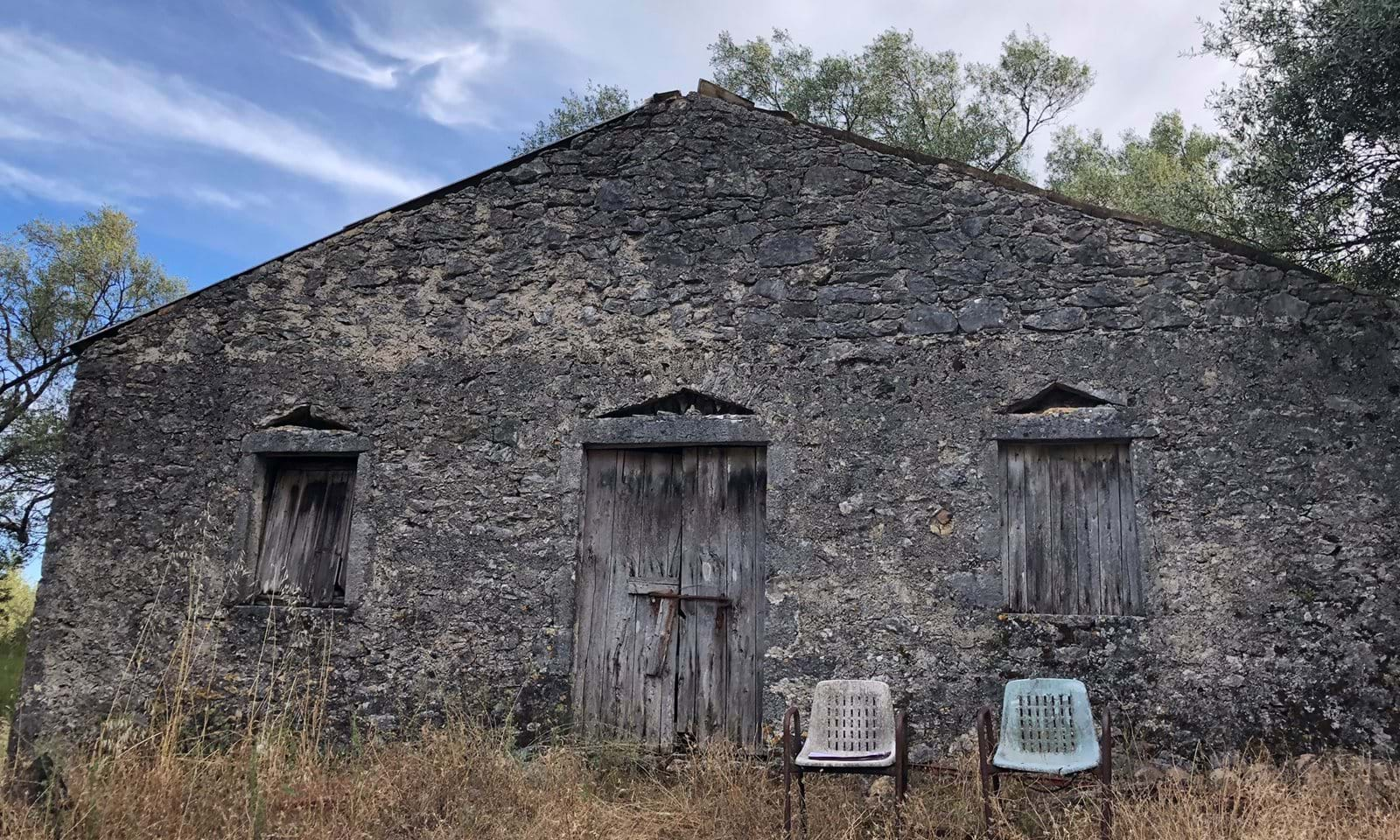 A rare find! This pretty stone building is set in a good sized plot of land and has lovely sea views.